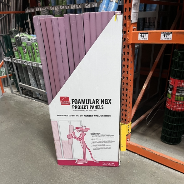 A display of wall panels, with a Pink Panther on the side.