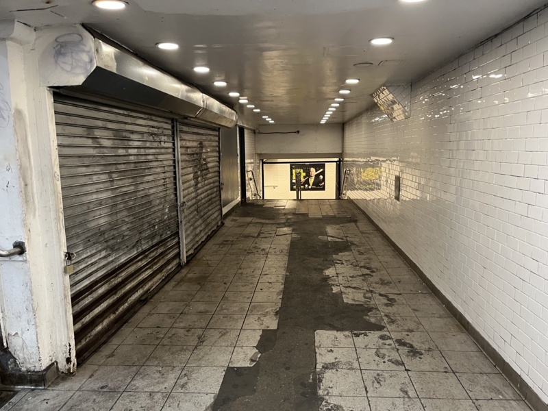 A very depressing subway entrance.