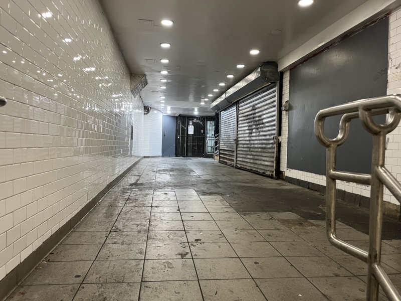 A very depressing subway entrance, seen from another angle.